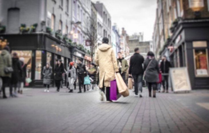 People shopping on a high street